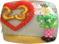 Оформление воздушными шарами 23 февраля №7 (5300 рублей) Сердце, цифры, фигура девушки